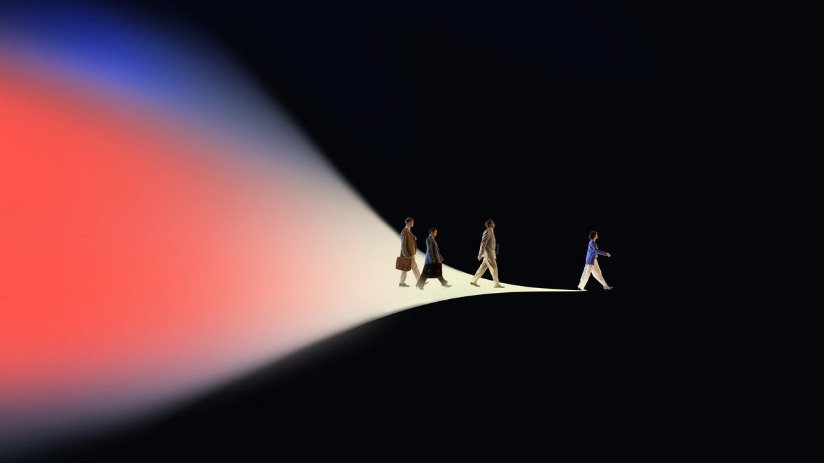A team member walking away